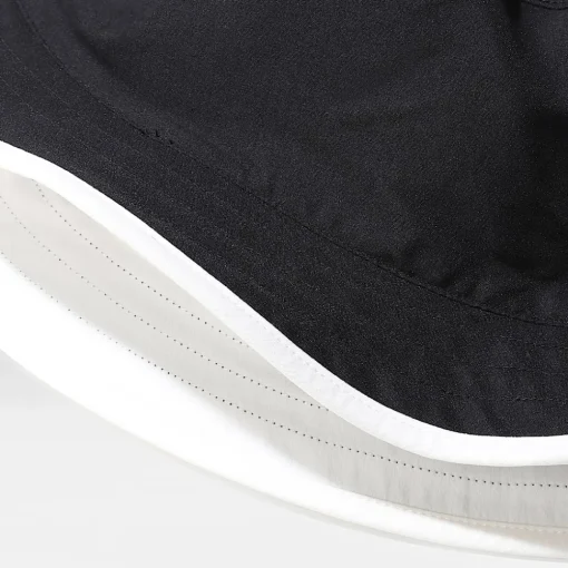 Shop The North Face Bob Réversible Class V TNF BLACK/GARDENIA WHITE